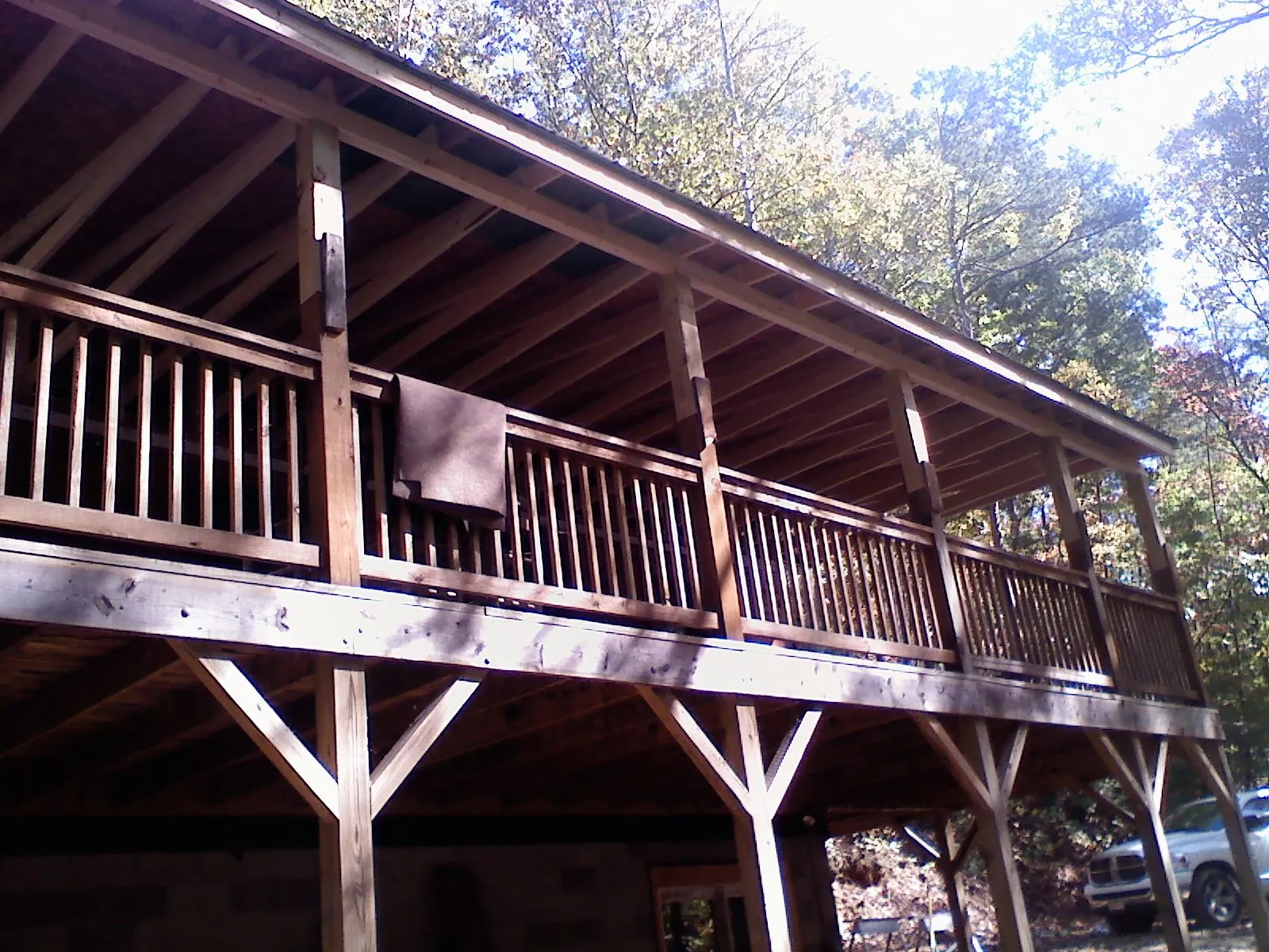 Timber framing under a new elevated porch and deck — Roof Leak Repair in Saint Marys by Roofing Brothers